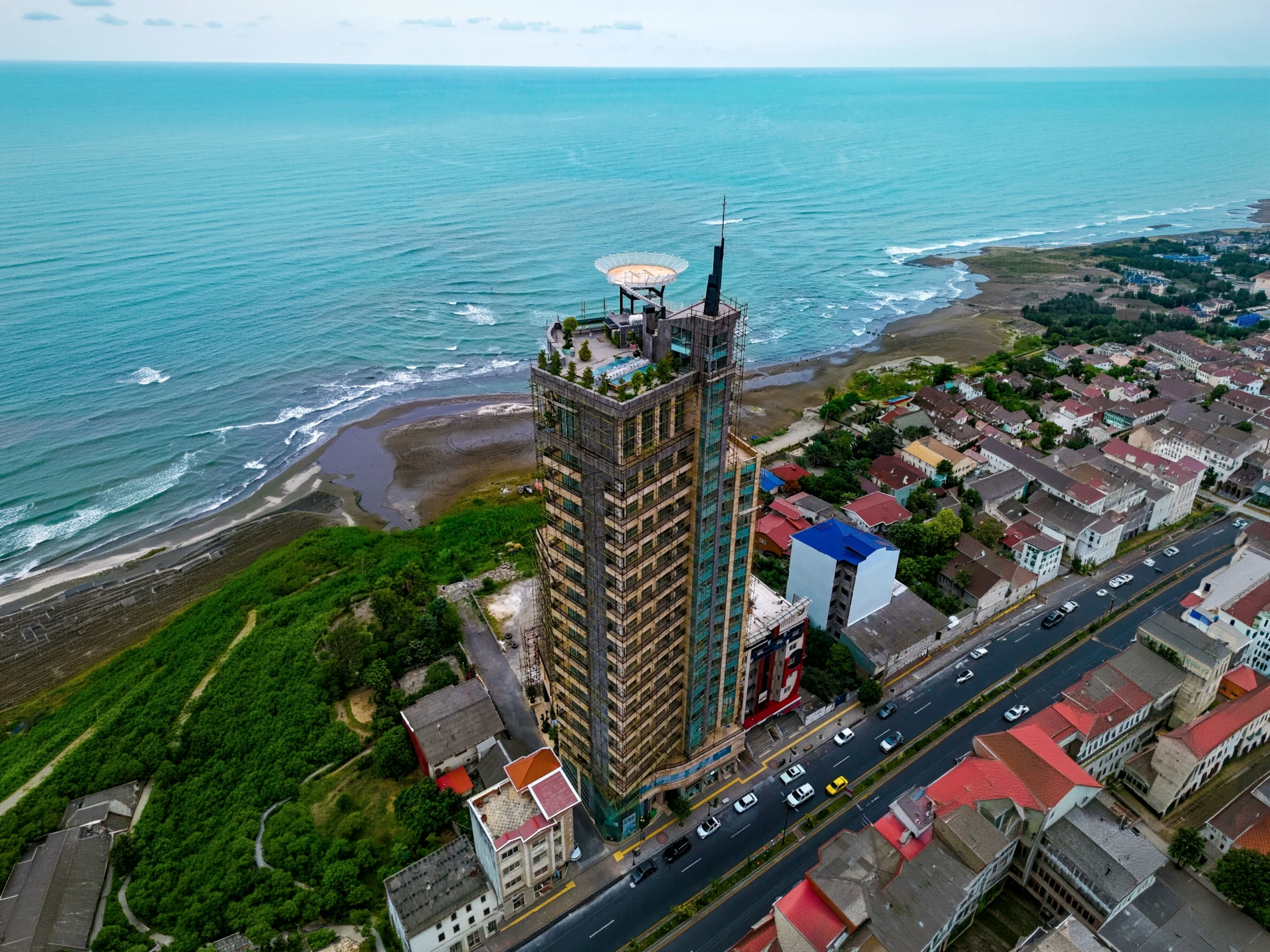 Overhead view of the rooftop terrace, pergola and helipad